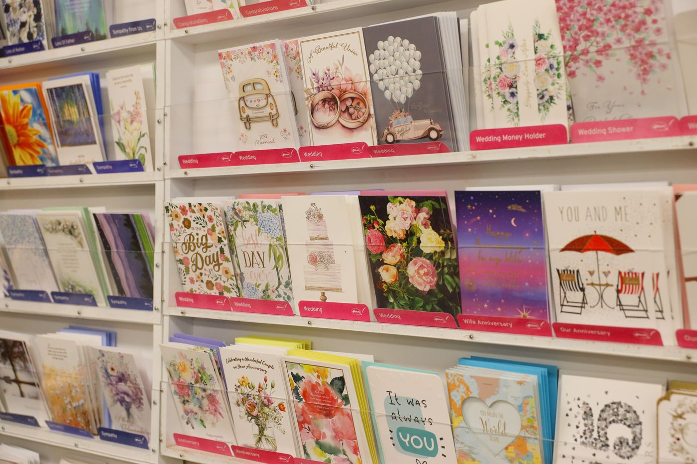 A wall of greeting cards for birthdays, weddings, and every occasion