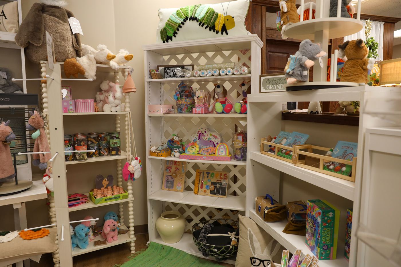 Shelves of plush animals and kids' gifts in the shop