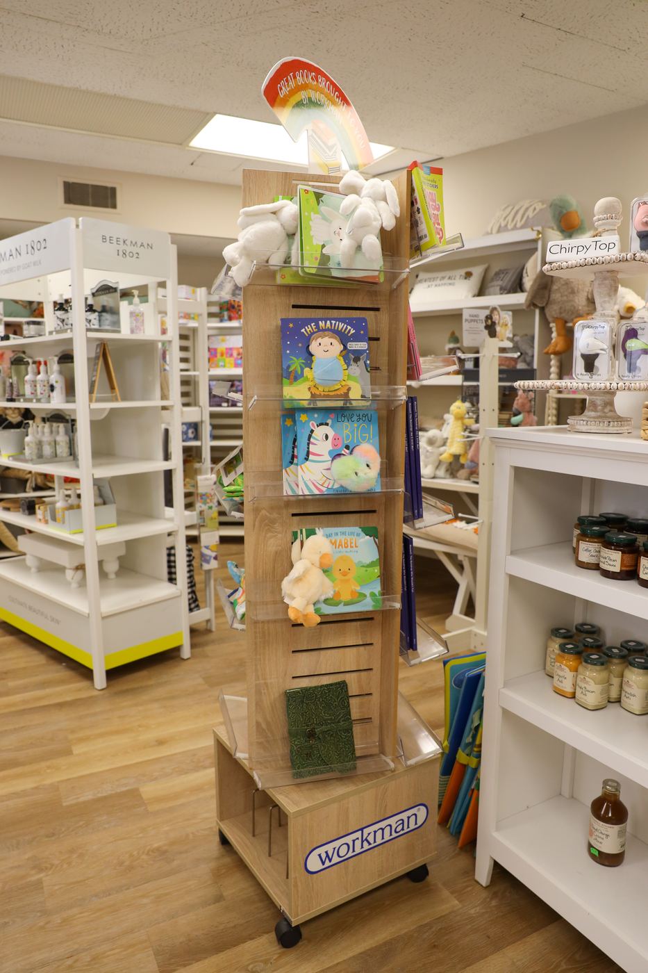 A wooden spinner of children's board books and picture books